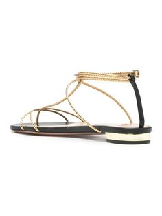 Step into timeless elegance with the Roman Romance Sandal Flat. This stylish yet comfortable sandal is perfect for strolling through the city or enjoying a leisurely day at the beach. With its classic design and soft, cushioned sole, you'll look and feel effortlessly chic all day long. Timeless and elegant design Comfortable for all-day wear Perfect for city strolls or beach days Chic Gold Luxury T-strap Sandals, Gold Flat T-strap Sandals For Vacation, Gold T-strap Sandals With Ankle Strap For Beach, Gold Flat T-strap Sandals For Beach, Gold Leather Adjustable T-strap Sandals, Comfortable Sandals, Flat Sandals, Beach Day, Elegant Design