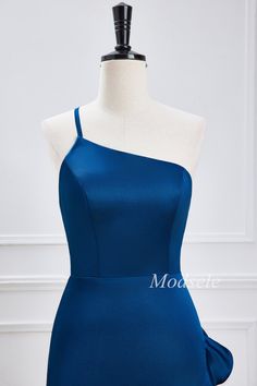 a blue dress on a mannequin dummy