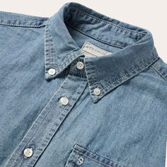 This rugged, western-inspired shirt is crafted from high-quality 100% cotton chambray that’s been garment washed for a soft, broken-in feel that will only get better with time. It has a full button front, button-down collar, no front yokes, a straight back yoke with center seam, pleat and a self-fabric locker loop. Cut in our Tailored Fit, a versatile style that’s slightly tapered at the sides for a streamlined appearance and a shorter length designed to look great tucked or untucked. No Front Y Pre-washed Cotton Button-up Shirt, Classic Unstructured Chambray Shirt, Classic Pre-washed Button-up Shirt, Classic Chambray Shirt In Light Wash, Classic Light Wash Chambray Shirt, Classic Relaxed Fit Pre-washed Shirt, Unstructured Chambray Shirt In Medium Wash, Unstructured Medium Wash Chambray Shirt, Classic Washed Light Indigo Shirt