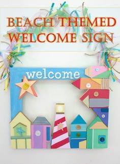 a welcome sign made out of wooden blocks with the words, beach themed welcome sign