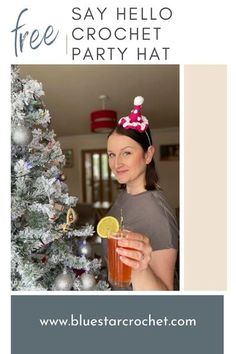 a woman holding a drink in front of a christmas tree with the words say hello, hello