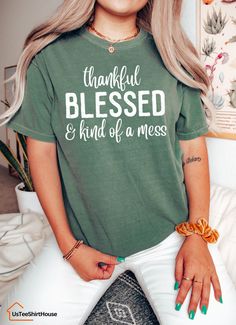 Comfort Colors® Thankful Shirt, Thankful Blessed And Kind Of A Mess Shirt, Thanksgiving Shirt, Autumn Shirt, Grateful Shirt, Blessed Shirt -Sizing and Color Guidelines- We use Comfort Colors Heavyweight brands t-shirts for all the listings where you see Comfort Colors in the title. The shirts are Unisex size. They are meant to be loose-fitting, so ordering one size smaller is recommended if you want a tighter fit. Each of our shirts is meticulously crafted to your specifications, making returns Green Cotton Shirt With Text Print, Green Cotton Shirt With Letter Print, Relaxed Fit Green Shirt With Text Print, Green Cotton Shirt With Funny Text, Casual Green Tops With Funny Text, Green Casual Top With Funny Text, Green Cotton Slogan Shirt, Green Cotton Shirt With Slogan, Soft-washed Green T-shirt For Fall