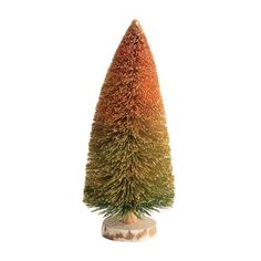 an orange and green christmas tree on a white background