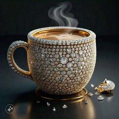 a cup filled with liquid and covered in lots of diamonds