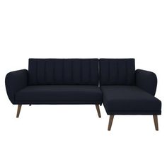 a black couch with a wooden frame and foot rest on it's side, against a white background