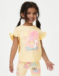 This pure cotton Peppa Pig™ t-shirt is perfect for young fans of the popular TV show. It's designed in a comfy regular fit, with a neat round neck and casual short sleeves. The front features a graphic of Peppa riding an inflatable unicorn at the beach, with glittery details and slogan 'Tropical feeling'. Summer Cartoon Print Playwear T-shirt, Summer Crew Neck Top For Playwear, Spring Character Print T-shirt For Playwear, Summer Character Print Tops For Playwear, Playful Summer T-shirt With Character Print, Spring Crew Neck T-shirt For Play, Spring Playwear Crew Neck T-shirt, Summer Playwear Crew Neck T-shirt, Cotton T-shirt With Character Print For Playwear