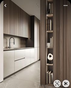 an image of a kitchen with bookshelves in it