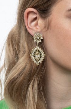 Exude extreme sparkle in these tonal crystal drop earrings anchored by floral clusters sure to make a glamorous statement. 2" drop, 1" width Post back Steel post back Goldtone plate/leather/glass/cotton Imported Deepa Gurnani, Steel Post, Crystal Drop Earrings, Crystal Drop, Gold Drop Earrings, Gold Tones, Sparkle, Nordstrom, Drop Earrings