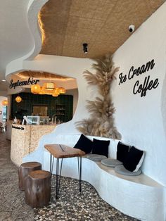 the coffee shop is decorated in white and black