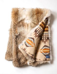 an image of a blanket with fur on it