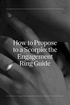 a woman's hand with the words how to propose to a scorpio the engagement ring guide