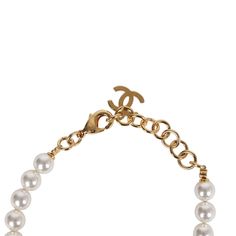 These Chanel CC denim heart and pearls bracelet features an adjustable faux white pearl chain with a CC blue enamel denim heart charm a gold tone hardware CC charm, and a lobster clasp.Origin: ItalyCondition: New and never wornAccompanied by: Box, felt jewelry cover, ribbon, carebook and retail UPC, Measurements: Length (circumference): 8" | Diameter: 2.5" ; 0.75" x 1" heart charm White Formal Jewelry With Logo Charm, Formal White Jewelry With Logo Charm, Luxury White Jewelry For Fashion Accessory, Elegant Adjustable Jewelry With Logo Charm, Elegant White Jewelry With Logo Charm, Elegant Gold-tone Charm Bracelet With Logo, Classic Adjustable Jewelry With Logo Charm, Luxury White Bracelets With Adjustable Chain, Luxury White Bracelet With Adjustable Chain