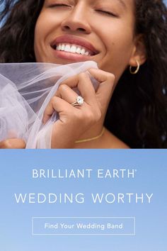 a woman smiling with her wedding band in front of blue sky and white clouds behind her is the words brilliant earth wedding worthy find your wedding band