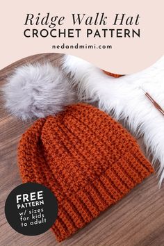 the ridge walk hat crochet pattern is shown in orange and white with a pom - pom on top