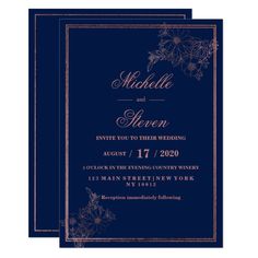 two navy blue wedding cards with gold foil flowers on the front and bottom, one is in