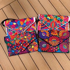 Mexican Embroidered Purses Black (Design varies) or White (Design varies) Can wear over the shoulder, cross body or a stunning clutch.  Perfect for spring, summer and a beach vacation! Summer Festival Multicolor Clutch, Multicolor Summer Festival Clutch, Floral Embroidered Bags For Summer Vacation, Summer Vacation Bags With Floral Embroidery, Floral Embroidered Summer Vacation Bags, Summer Travel Clutch, Summer Bags With Multicolor Embroidery, Multicolor Embroidered Beach Bags For Summer, Summer Multicolor Embroidered Clutch