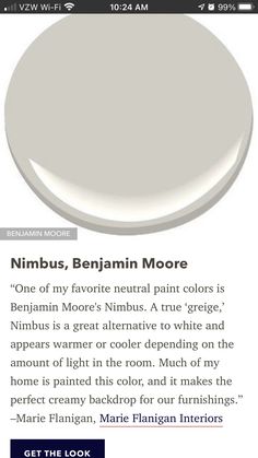 a white toilet with the words nimus, benjamin moore on it