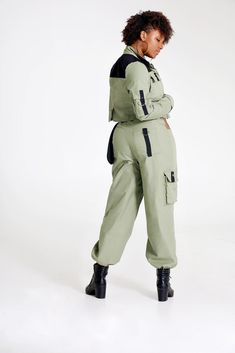 "Let them catch your vibe wearing this edgy pant set with matching jacket. This combo is crafted with cotton, mixed with denim, and designed with three pockets on the jacket, and three pockets on the pants, Cargo style! The jackets design is color blocked for that edginess it brings and the pants has a unique outer pocket on the left front and a half belt closure. Pair up this outfit with a cute bandeau top, or bodysuit and combat boots, Make all your friends wish they had this set too. All of o Spring Cotton Combat Cargo Pants, Spring Combat Cotton Cargo Pants, Spring Combat Cotton Pants, Cotton Sets With Pockets For Workwear, Trendy Cotton Workwear Sets, Cotton Workwear Sets With Pockets, Fall Combat Cotton Pants, Cotton Combat Pants For Fall, Fall Cotton Combat Pants