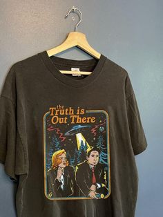 Our most popular designs pressed on a mineral wash, boyfriend fitting comfort tee Don't see the color option you want? Select white then type the name of the color you want in the space provided. X Files Birthday, X Files Aesthetic, Scully And Mulder, The Truth Is Out There, Geeky Clothes, Mom Graphic Tees, X Files, Funny T Shirt, Transfer Vinyl