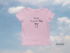 🌸 Minimalist coquette bow trendy baby tee with the savage quote "blessed with beauty and rage"🌸 🛍️ Ordering Instructions     1. Choosing size      2. Choosing your shirt color     3. Place order 👚 Product Details     - 100 % heavy cotton     - Baby Tee Fit: Longer than crop-top and slightly slim fit      - Tear-away labels 📦 Shipping & Production     - Processing Time: Orders are processed within 1-2 days.     - Shipping Time: 2-5 days, depending on your location.     - US domestic shipping Fitted Pink T-shirt As A Gift, Fitted Short Sleeve Tops Gift, Fitted Short Sleeve Tops For Gift, Fitted Crew Neck T-shirt As A Gift, Blessed With Beauty And Rage, Minimalist Coquette, Girlfriend Shirt, Girlfriend Shirts, Y2k Women