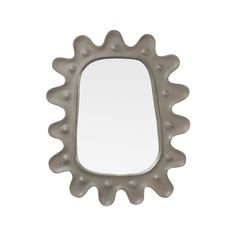 a mirror that is shaped like a sunflower with holes in the front and sides