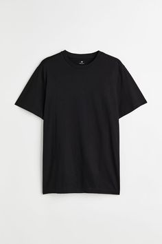 Regular-fit T-shirt in soft cotton jersey. Ribbed crew neck and a straight-cut hem. Black T Shirt Men, Black Outfits, Pink Men, Basic Shirts, Fitted Sweater, Classic Silhouette, Black T Shirt, Straight Cut, Sweater Vest