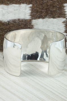 This sterling silver bracelet was made by Navajo silversmith Freddie Douglas. The inside is signed and stamped sterling.Size: 5 1/2" (will fit up to a 6 5/8" wrist)Gap: 1 1/8"Width: 1 3/8"Free shipping on all orders! We ship with USPS and always include tracking. All orders ship within a day of payment.Returns are accepted up to 30 days after you receive your order. Just send us a message. Our shop offers cash back or store credit. The item must be returned in new condition. Native American Jewelry, Free Jewelry, Sterling Silver Bracelets, Cuff Bracelets, Silver Bracelet, Stamp, Sterling Silver, Silver