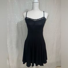 Brand New Never Worn. Size Xs, No Damage. Adjustable Straps And Gathered Lace Trim Bust. Very Stretchy Measurement Lying Flat: Armpit To Armpit 12” Waist 12” Armpit To Hem 26” Black Fitted Mini Dress With Spaghetti Straps, Casual Fitted Mini Dress With Spaghetti Straps, Fitted Black Mini Dress With Lace Trim, Lined Fitted Mini Dress Casual Style, Casual Fitted Mini Dress Lined, Casual Fitted Mini Dress With Lining, Stretch Mini Dress With Lace Trim For Night Out, Elegant Fitted Mini Dress By Urban Outfitters, Fitted Flirty Mini Dress By Urban Outfitters