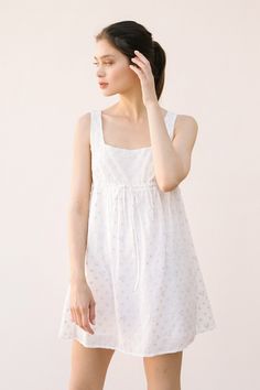 Storia Storia Sleeveless Embroidered Stars Babydoll Dress - Little Miss Muffin Children & Home White Cotton Sundress With Square Neck, Feminine Square Neck Sundress For Daywear, White Sundress With Smocked Bodice And Square Neck, White Sundress With Tie Straps And Square Neck, White Square Neck Sundress With Tie Straps, White Square Neck Sundress For Daywear, White Square Neck Sundress, Embroidered Stars, Baby Doll Dress