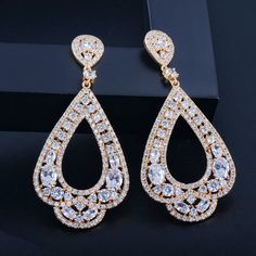 If you re looking for a fine jewelry which looks sepecial, precious stone please consider cubic zirconia earrings /Party Earrings Exquisite Diamond White Crystal Earrings, Glamorous Cubic Zirconia Clip-on Earrings For Anniversary, Bridal Diamond Drop Earrings With Rhinestones, Exquisite Diamond Accented Earrings For Party, Diamond White Sparkling Earrings, Dazzling Diamond White Sparkling Earrings, Exquisite Diamond Accent Earrings For Party, Dazzling Sparkling Diamond White Earrings, Exquisite Earrings With Diamond Accents For Party