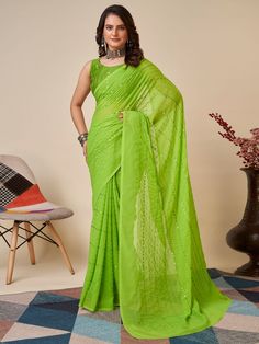 Elevate your ethnic wardrobe with our stunning bewitching green sequins georgette mehendi wear saree with blouse. This beautiful saree is crafted from high-quality georgette material, ensuring a comfortable and elegant drape. The green color is perfectly complemented by the intricate thread embroidery and sequin work, giving it a festive and glamorous look.
This saree comes with a matching art silk blouse material, also embellished with thread embroidery and sequin work. The 5.50 meters saree an Green Chikankari Pre-draped Saree For Diwali, Green Georgette Pre-draped Saree With Traditional Drape, Green Georgette Pre-draped Saree, Pista Green Pre-draped Georgette Saree With Mirror Work, Pista Green Pre-draped Saree With Mirror Work, Green Chanderi Pre-draped Saree With Chikankari Embroidery, Pista Green Georgette Pre-draped Saree With Mirror Work, Festive Green Pre-draped Saree With Self Design, Green Pre-draped Saree With Mirror Work