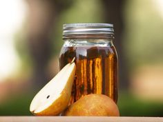 an apple and honey jar sitting on a table