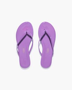 Patent Gloss Lily sandals feature a sleek and glossy finish that elevates their minimalist design with a playful burst of color. Flip Flop Sandals, Black Sandals, Minimalist Design, Womens Sandals, Lily, Sandals