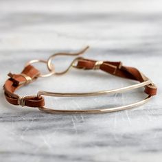 This simple boho bracelet is a great relaxed staple piece. It looks great on it's own or layered with so many different styles that the possibilities are endless. Each bracelet has a heavy duty hammered narrow rectangle in sterling silver or 14k gold fill, as well as a beautiful handmade clasp. This bohemian minimalist Bohemian Minimalist, Bracelet Simple, Boho Bracelet, Suede Flats, Boho Bracelets, Leather Lace, Bold Prints, Staple Pieces, Brown Suede