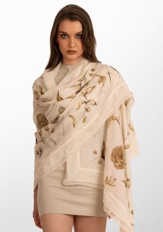 Wrap yourself in luxury with this ivory scarf crafted from a very fine cashmere and adorned with a stunning hand-painted Vintage design. The subtle tonal ivory georgette frill and filigree lace border adds a touch of refinement, making it an exquisite and versatile accessory that effortlessly merges timeless elegance with artistic charm. This scarf is a unique marterpiece that demands a place in every discerning woman's wardrobe. Lace Border, Women's Wardrobe, Cashmere Scarf, Vintage Design, No Frills, Vintage Designs, Timeless Elegance, Cashmere, Unique Designs