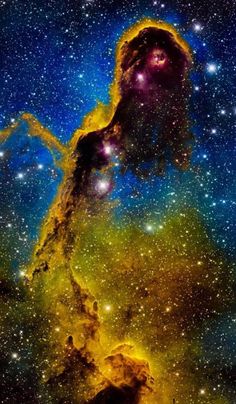 an image of the horsehead in space with stars around it and blue sky behind