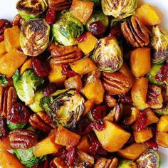 brussel sprouts and brussels sprouts with pecans in a white bowl