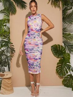 This Floral Dream Bodycon dress features a stunning floral print and ruched detail. The fitted silhouette creates a flattering look, perfect for any occasion. Elevate your style with this elegant dress that combines fashion and function. Color : Multicolor Style : Elegant Pattern Type : Floral, Tie Dye, All Over Print Type : Bodycon, Tank Details : Ruched, Split Neckline : Stand Collar Sleeve Length : Sleeveless Fit Type : Slim Fit Length : Midi Waist Line : Natural Hem Shaped : Pencil Material Fitted Floral Midi Dress With Ruched Details, Fitted Midi-length Floral Dress With Ruched Detail, Fitted Midi Length Floral Dress With Ruched Details, Fitted Sleeveless Ruched Floral Dress, Fitted Ruched Floral Dress For Summer, Fitted Floral Dress With Ruched Detail For Summer, Spring Knee-length Ruched Bodycon Dress, Floral Print Midi Bodycon Dress For Spring, Spring Floral Print Midi Bodycon Dress