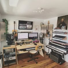 a room filled with lots of musical equipment