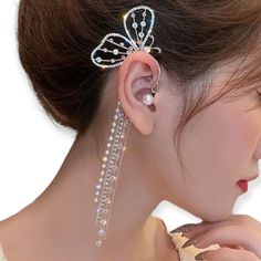 Indulge In The Ultimate Statement Piece With These Butterfly Wing Ear Cuff Tassel Earrings. Boasting Shimmering Butterfly Wings And Vibrant Crystals, These Earrings Exude Luxury While Remaining Affordable. Let Your Inner Beauty Shine As You Glisten And Radiate Charm. The Delicate Silver Tassels, Dazzling Crystals And Elegant Cascading Chains Add A Touch Of Glamour To Your Look. Transform Into A Graceful Butterfly And Soar To New Heights Of Style And Sophistication. One Per Order Total Length 6" Wing Ear Cuff, Dark Earrings, Ear Cuff Earrings, Tassel Earing, Red Heart Earrings, Crystal Heart Earrings, Long Tassel Earrings, Silver Ear Cuff, Crystal Hoop Earrings