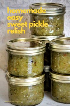 four jars filled with homemade easy sweet pickle relish