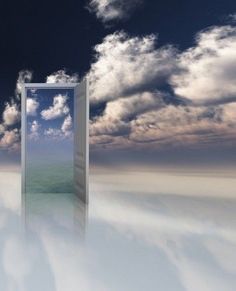 an open door in the middle of a white floor with clouds behind it and blue sky above