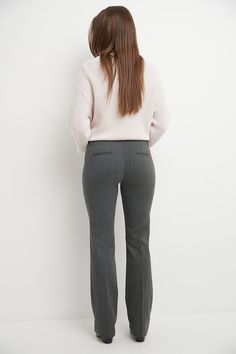 You want to be known for your work but, at the same time, also make a statement with your signature look. These barely bootcut pants let you strike the right balance between flamboyant and subtle. The modern, slightly narrower leg of these pants preserve everything good about the classic bootcut design, while the soft waistband supports and has a slimming effect on your figure. Pair them up with formal or casual tops to easily get the perfect look for any occasion. Faux front and back pockets wi Classic Flare Pants For Business Casual, Classic Flare Pants For Office, Classic Flare Pants For The Office, Classic Flare Business Casual Pants, Classic Flare Dress Pants For Business Casual, Classic Office Flare Pants, Classic Flare Pants For Workwear, Classic Flare Dress Pants For Workwear, Elegant Straight Leg Flares For Workwear