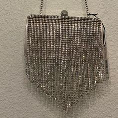 Dillard’s Brand Rhinestone Fringe Clutch Evening Bag Chain Crossbody Detachable Blush Under The Rhinestone Fringe Chic Silver Bags With Rhinestones, Silver Bling Bags For Night Out, Silver Clutch Bag For Night Out, Silver Clutch For Night Out, Chic Silver Crystal Evening Bag, Silver Crystal Clutch Bag, Silver Evening Bag With Bling For Night Out, Glamorous Silver Bag With Rhinestones, Silver Crystal Clutch With Bling