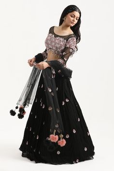 Black lehenga with bead and resham embroidered circle motifs on a pleated base. Comes with a padded sheer yoke blouse highlighted by embroidered floral circle motif pattern and bead tassels. Comes with sheer dupatta. - Aza Fashions Black Choli With Intricate Embroidery In Georgette, Embellished Black Traditional Wear For Navratri, Black Embellished Dress For Navratri, Embroidered Black Anarkali Party Wear Set, Embroidered Black Anarkali Set For Party, Black Embroidered Anarkali Set For Party, Embellished Black Anarkali Set For Festivals, Black Embellished Anarkali Set For Festivals, Semi-stitched Embellished Black Choli