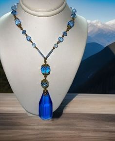 Art Deco Blue Lozenge Czech Glass 2 Drop Pendant Various Bead Shape Necklace  | eBay Blue Faceted Czech Glass Jewelry, Luxury Czech Glass Necklaces, Adjustable Multi-strand Czech Glass Necklace, Vintage Blue Czech Glass Necklace, Blue Czech Glass Spiritual Necklace, Czech Glass Jewelry, Deco Blue, Antique Jewelry Necklace, Beautiful Costumes