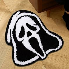 a black and white rug with a dog's head on it