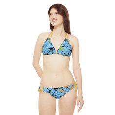 Dive into the rhythm of your favorite music with the Women's Sky Blue Splash Strappy Bikini! Made with 82% microfiber polyester and 18% spandex, it offers comfort and flexibility for dancing the night away. Its medium-weight fabric, removable cups, and adjustable elastic straps ensure the perfect fit. Choose from 7 vibrant strap colors to match your festival vibe. Welcome to an electrifying blend of style and fun, because nothing screams festival season like our Sky Blue Splash Strappy Bikini! #