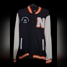 Naruto Jacket Men's Black Track Jacket For College In Spring, Black Track Jacket For College, Spring Season, Black Long Sleeve Outerwear For Campus, Black Long Sleeve Varsity Jacket For Campus, Black Sporty Outerwear For Campus, Black Casual Outerwear For Campus, Black Cotton Campus Outerwear, Casual Black Outerwear For Campus, Black Cotton Outerwear For Campus