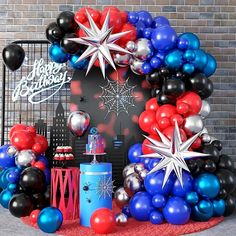 a birthday party with balloons and decorations